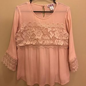 Light pink flowy top.